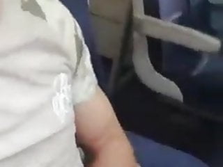 Hunk shows off his cock in a public train