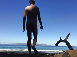 God walks into water at nude beach
