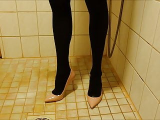 Pissing in pink stiletto high heels and nylons