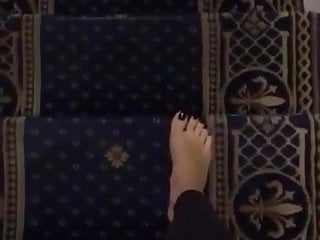 Barefoot on stairs