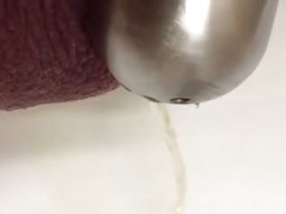 My slave piss with chastity at work