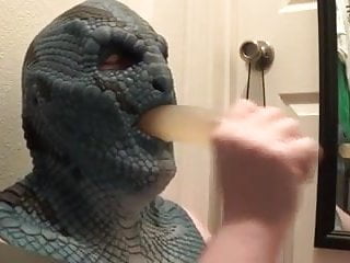 Latex lizard mask sucking dildo...