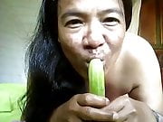 Thai gf topless cucumber blowjob