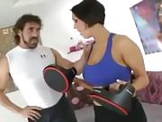 Gorgeous brunette fucks trainer