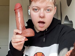 Trans boy Alexander gags on huge dildo