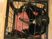 Caged rubberslave - 2