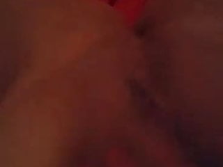 Masturbating
