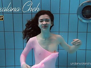 Roxalana cheh wearing pink dress pool...