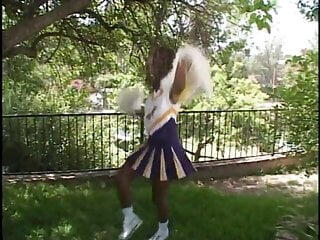 Pretty ebony cheerleader enjoys white cock...