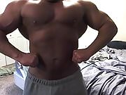 Bodybuilder with big cock flexing