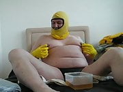 pisspig wallowing in piss wearing rubber shorts