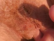 The sound of my mature wife's red hairy pussy