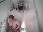 sitting in the bathtube