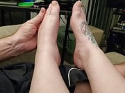 Husband rubbing my lotion on my feet