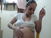 Pregnant Rita smoking