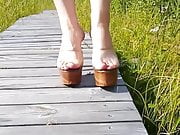 Lady L walking wooden sexy mules.