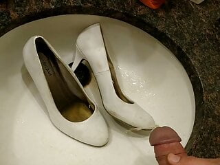 Filling white high heels with piss...