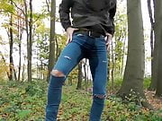 wetting my destroyed jeans in the forest