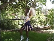Pretty ebony cheerleader enjoys white cock banging