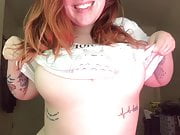 Tattooed girl shows big tits
