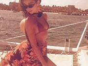 Sarah Hyland on a boat in a sexy bikini top