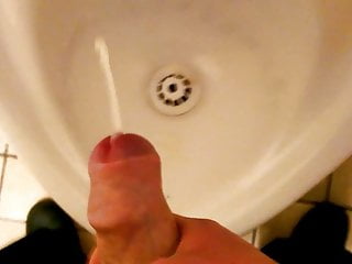 Cumshot in public toilet urinal...