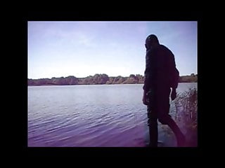 Swimming with PVC suit in the lake