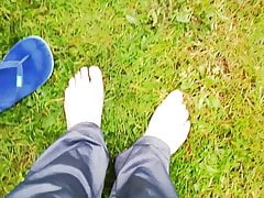 Bare feet on the grass