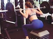 Madison Lintz lifting weights at the gym