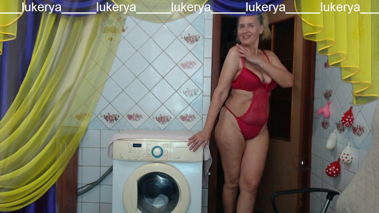 And again, the middle-aged, cheerful Lukerya seduces fans with her sexy body on a webcam, flirts merrily