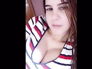 Latina with huge tits jams a dildo in her pussy