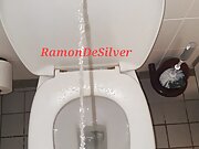 Master Ramon pisses on the toilet dominantly, dirty horny, golden champagne for the slaves