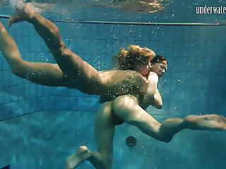 Hottest chicks swim nude underwater...