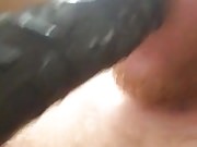 Stupid sissy cock whore fucking his own throat with a dildo