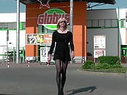 Crossdresser Tgirl In Black Dress, Stockings and High Heels