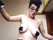 Busty drag king shows how to tape back her big tits
