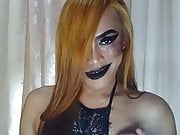 Heavy make-up trap with black lipstick mouth teases you