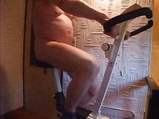 Slave J1306: Cycling naked with cock cage