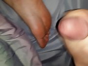 Jerking and cumming all over my girls feet at night 