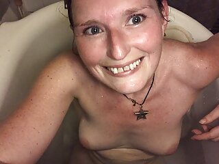 Hot step-mom masturbating with a vibrator in the bath and the orgasmic aftermath 