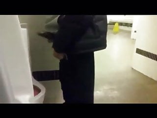 Hung latino showing off public toilet...