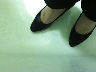 Friends sexy feet in wet office...