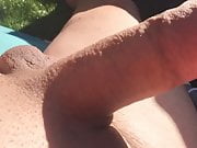 Playing with my cock in the sun...
