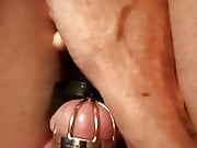 Sissy cums her in little cage with vibrator 