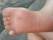 pantyhose feet & soles tease from outdoor track!
