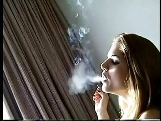 Sexy Blonde Smoking With...