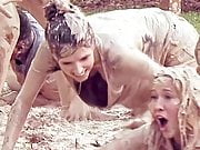 Anna Kendrick showing cleavage as she crawls in mud