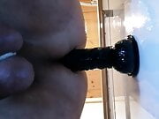 Masturbation with a dildo